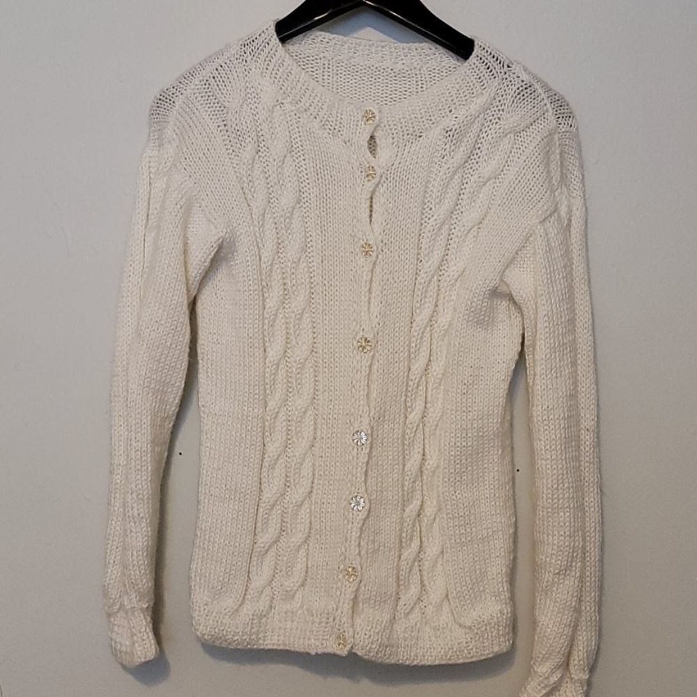  Hand knitted cardigan.